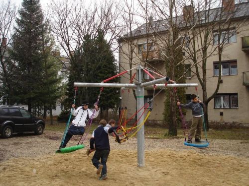 Children on the playground equipment "round trip"