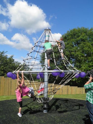 Childrens playing on climbing whirl